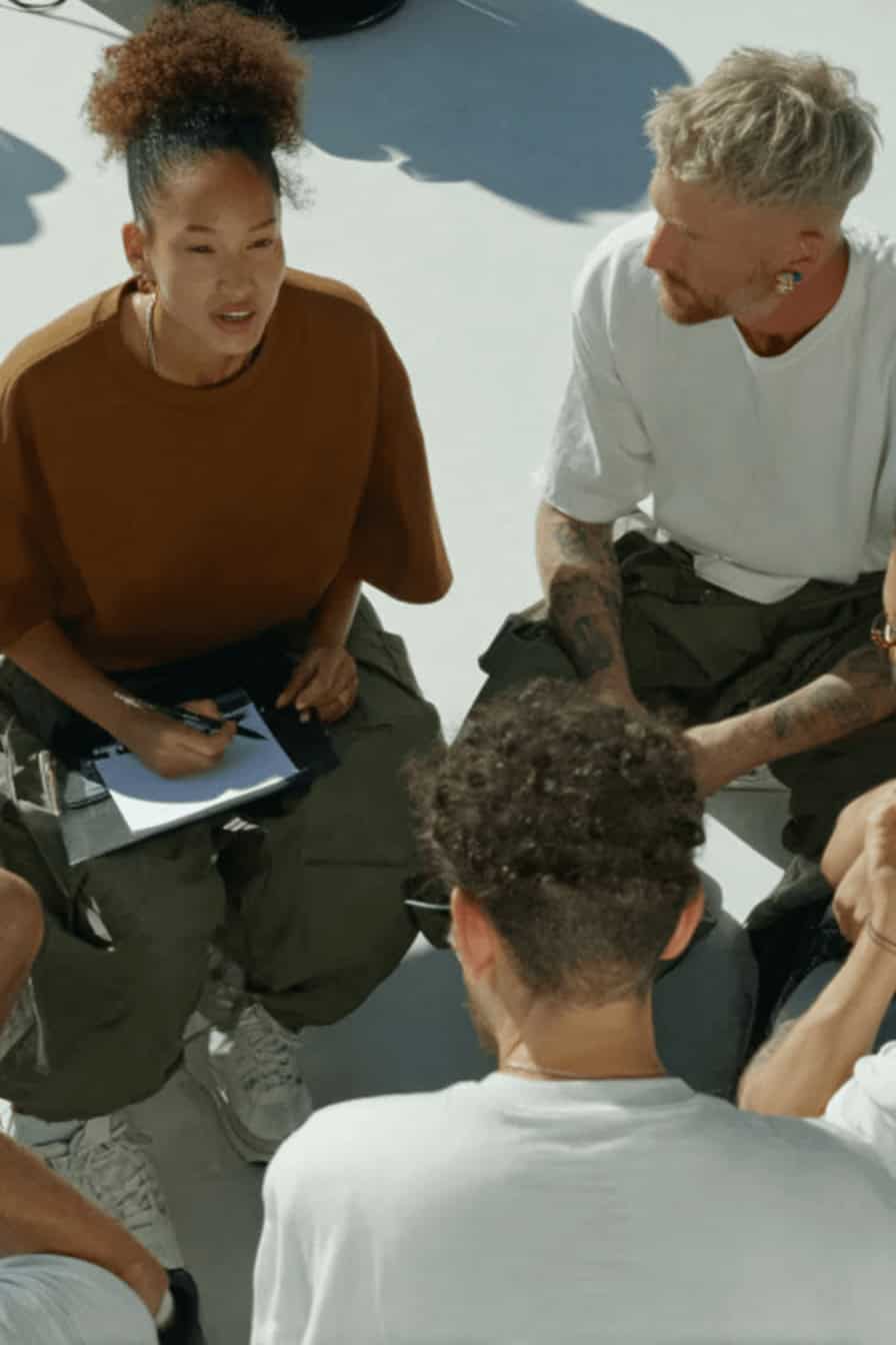 Group of people discussing Medicare Part B therapy compliance